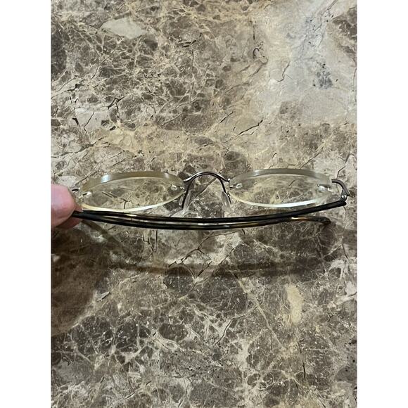 Marchon Airlock 2 - 770/39 RIMLESS EYEGLASSES 47-21-135 color 015 Tortoise - Picture 6 of 11